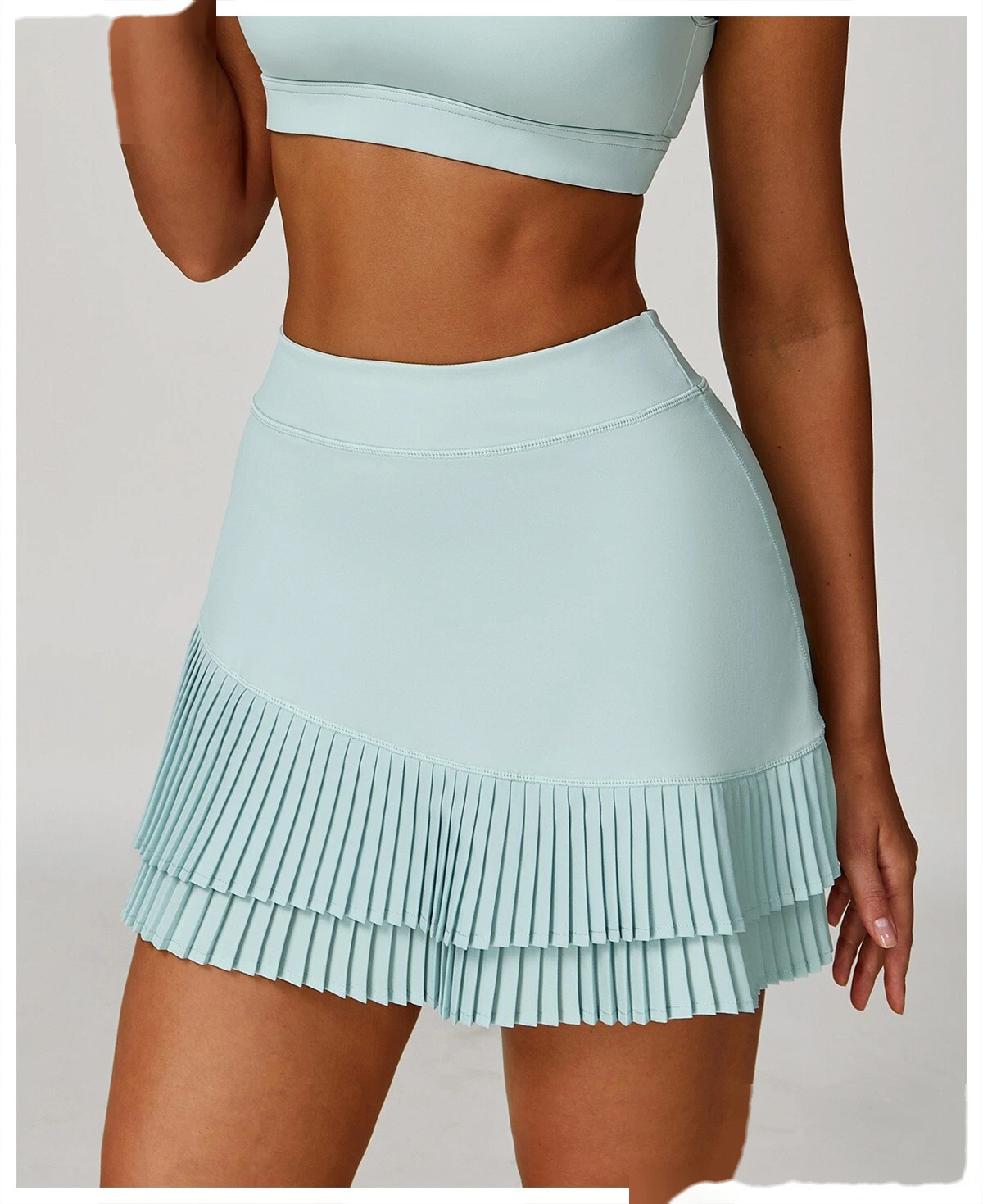 Customized sports skirt with high waist and pleated leggings pocket skirt to prevent exposure detail