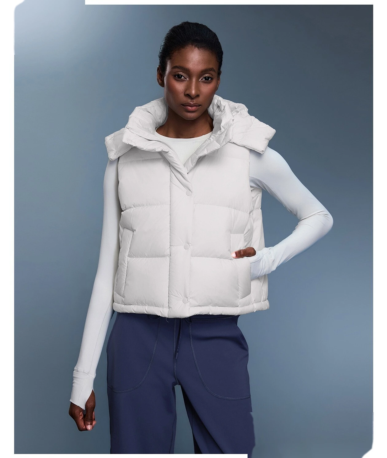 Custom windproof and warm hooded down vest jacket for women in winter. detail