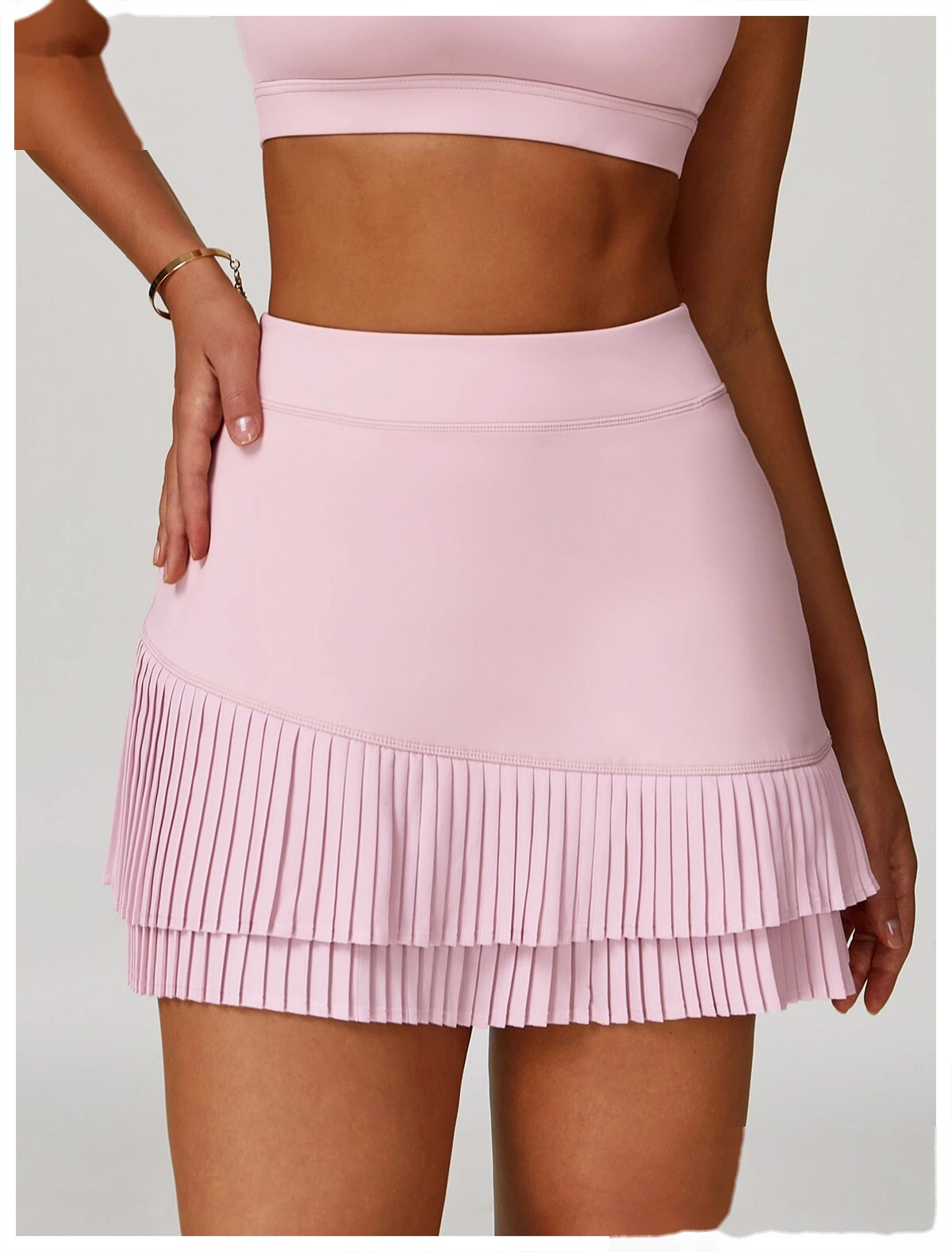Customized sports skirt with high waist and pleated leggings pocket skirt to prevent exposure detail