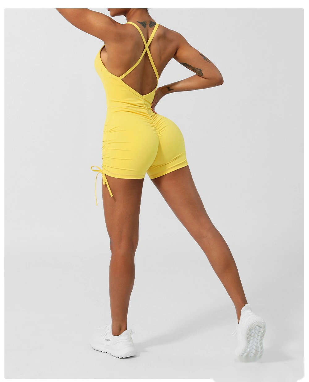 Custom-made European and American thin ribbon cross back yoga clothes tight shorts jumpsuit with chest pad detail