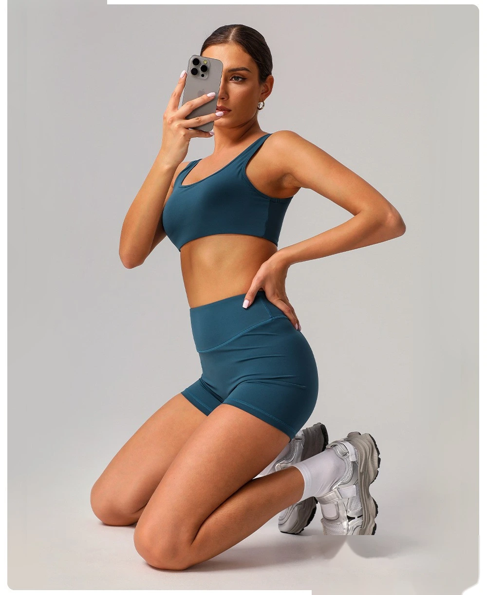 Custom nude yoga shorts hip running fitness pants tight high waist outdoor sports shorts female detail