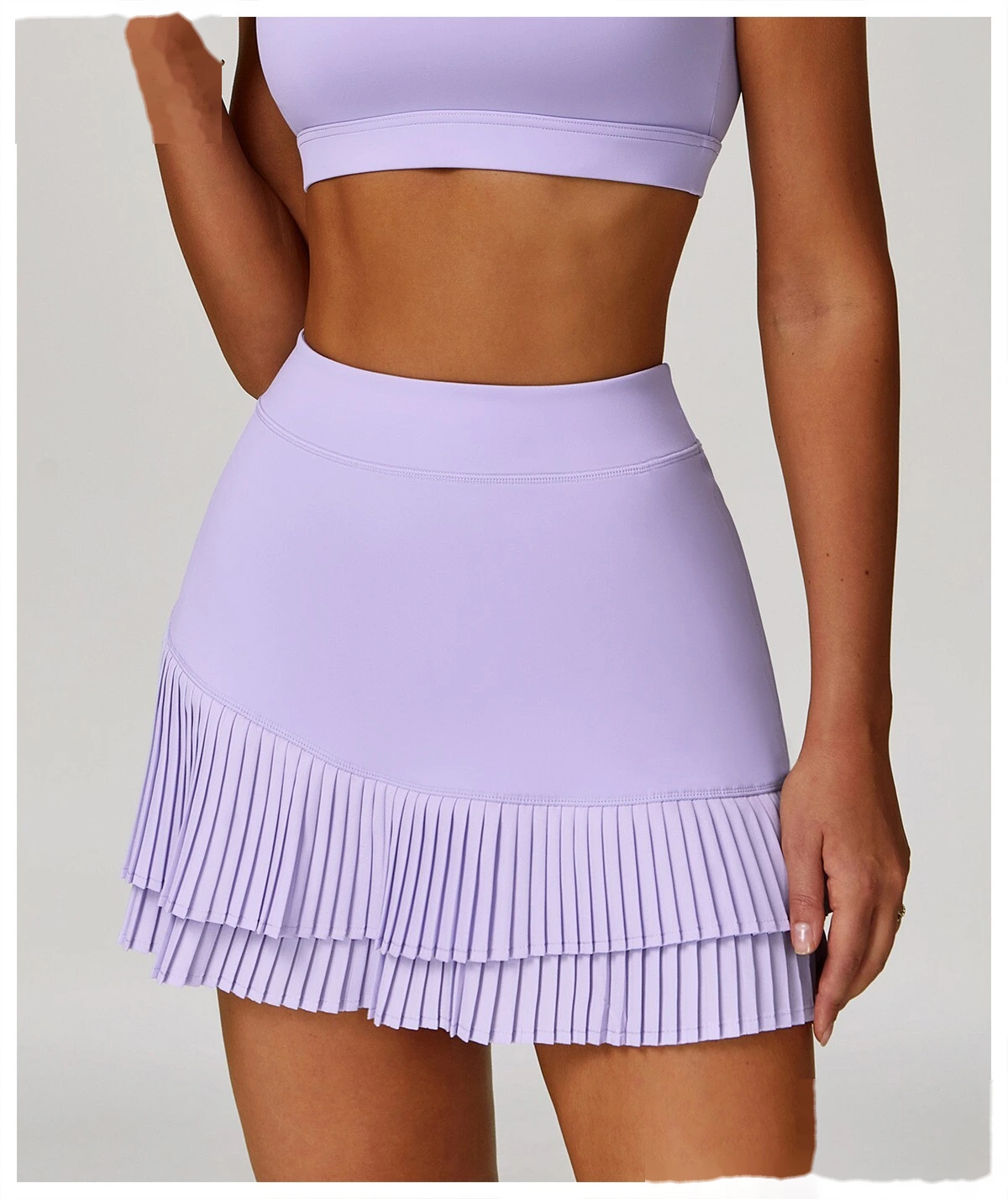 Customized sports skirt with high waist and pleated leggings pocket skirt to prevent exposure detail