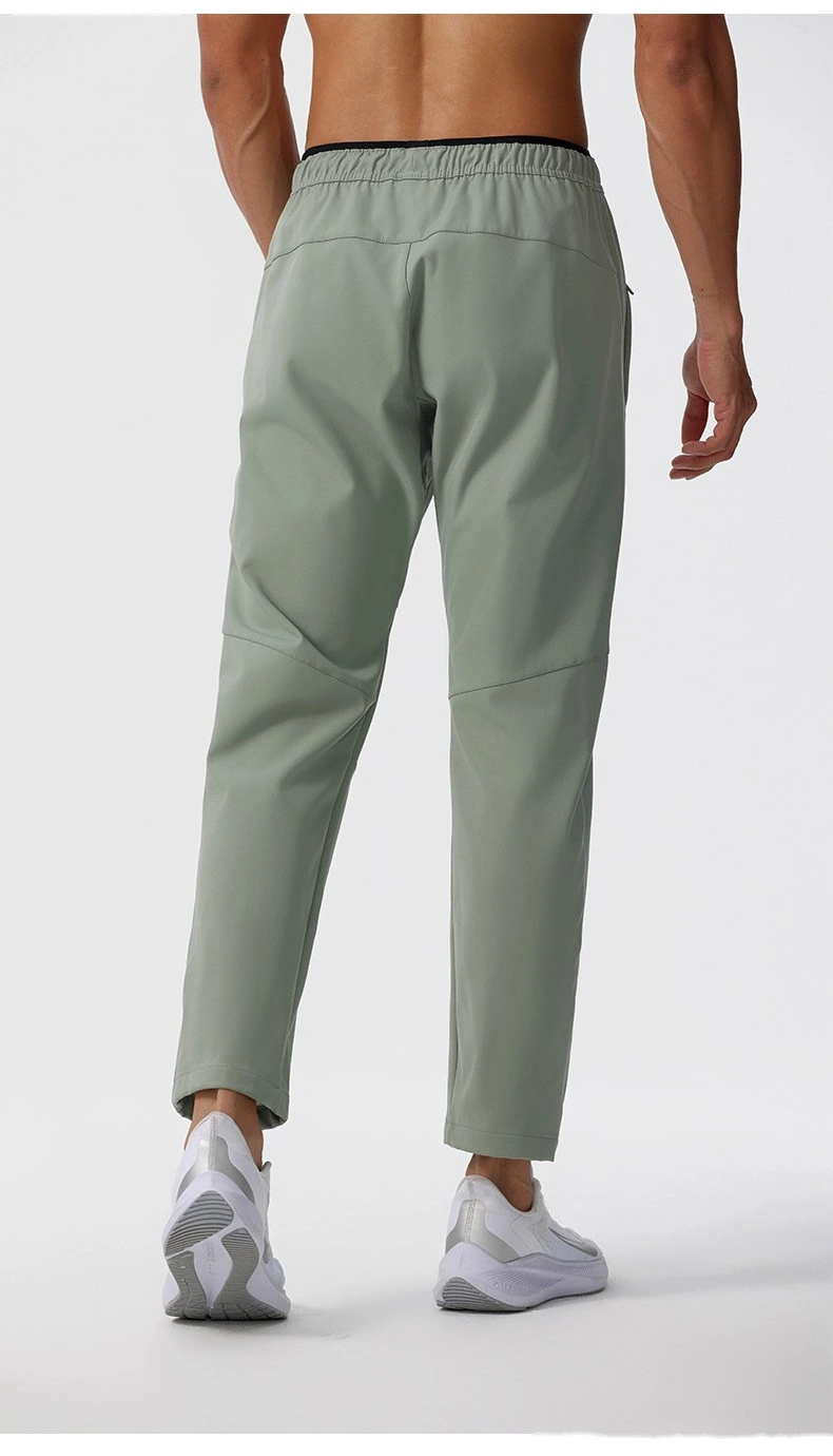 Customized outdoor quick-drying pants waterproof and windproof men's casual running pants detail