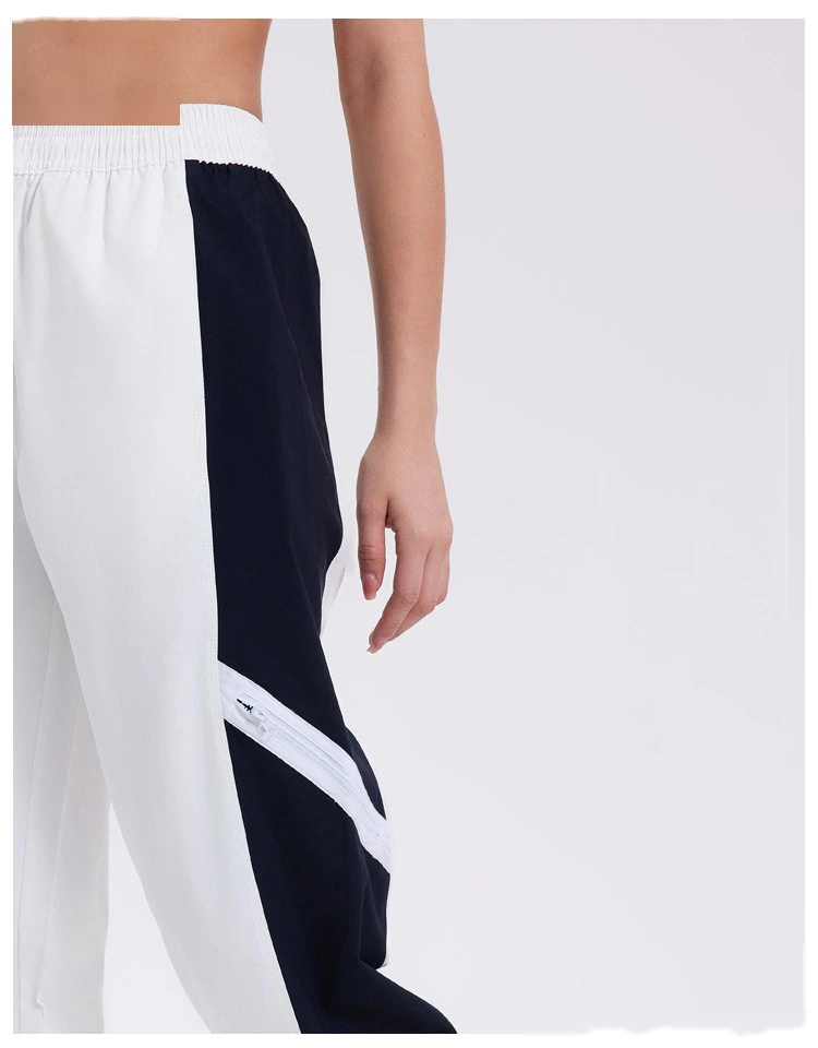 Custom-made windproof woven contrast sports pants women's zipper split toe casual pants detail