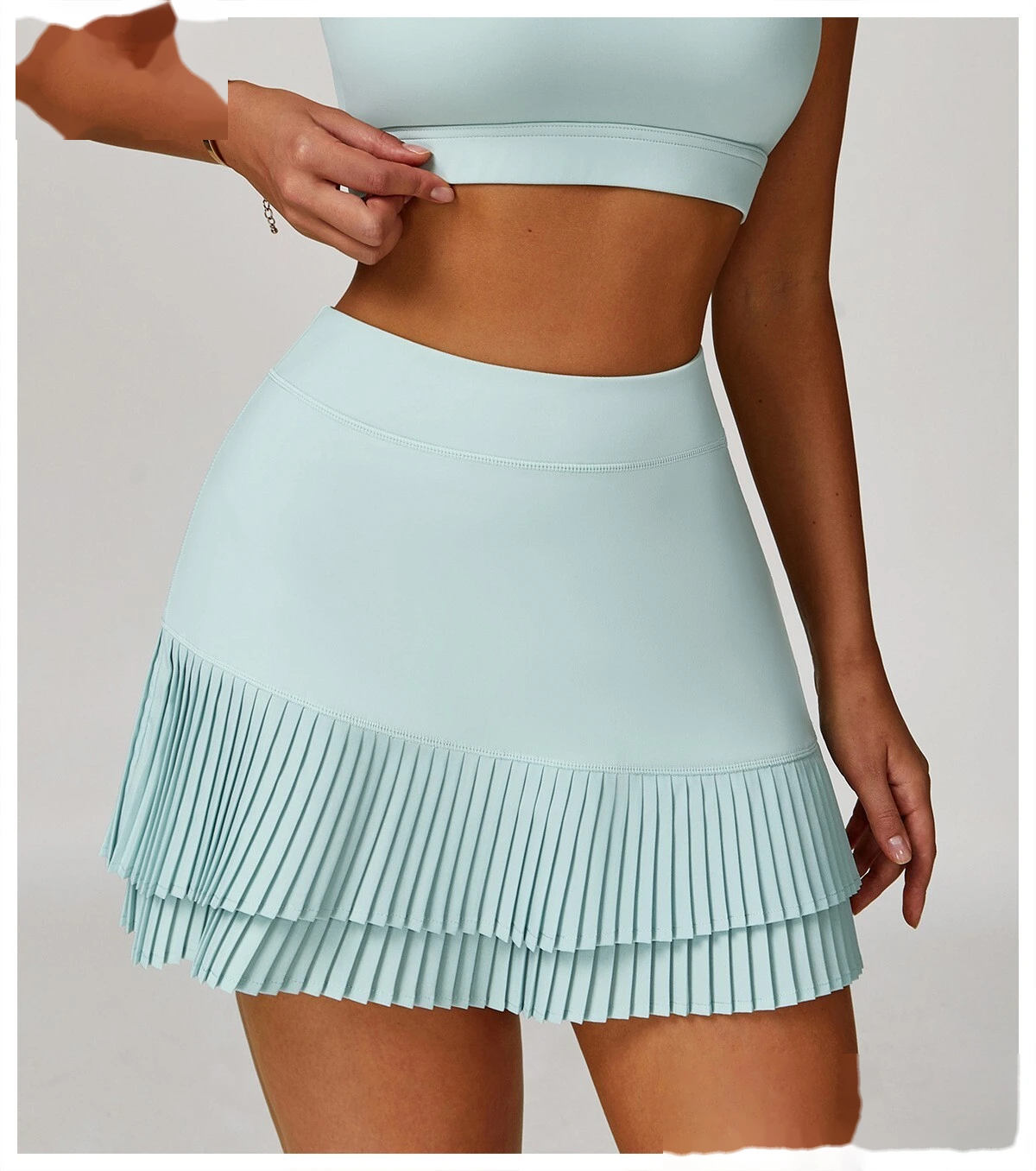 Customized sports skirt with high waist and pleated leggings pocket skirt to prevent exposure detail