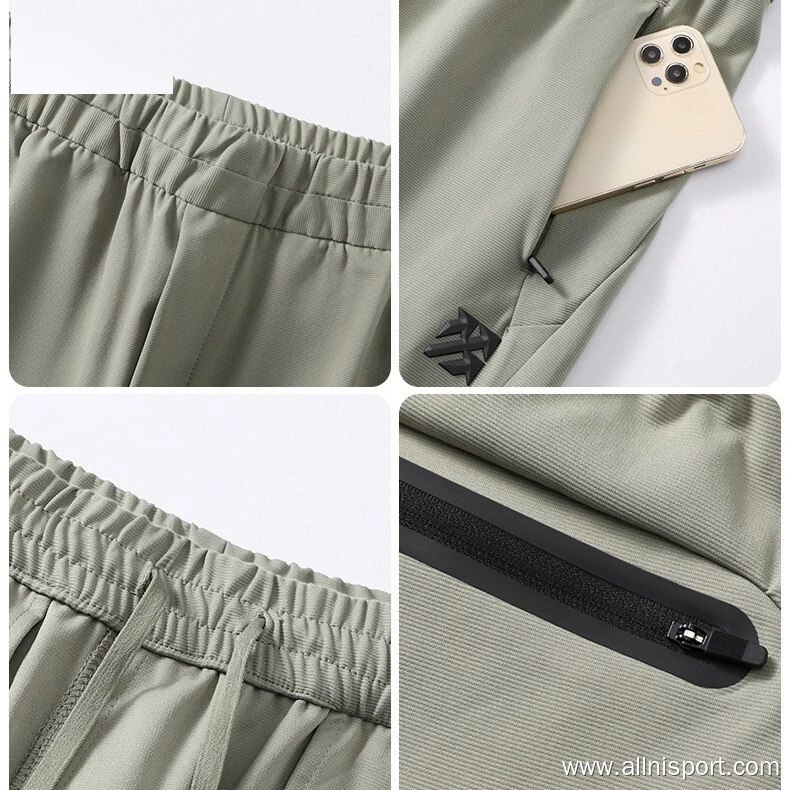 Outdoor ice sports shorts men's quick-drying leisure sports pants five pants running fitness slacks. detail