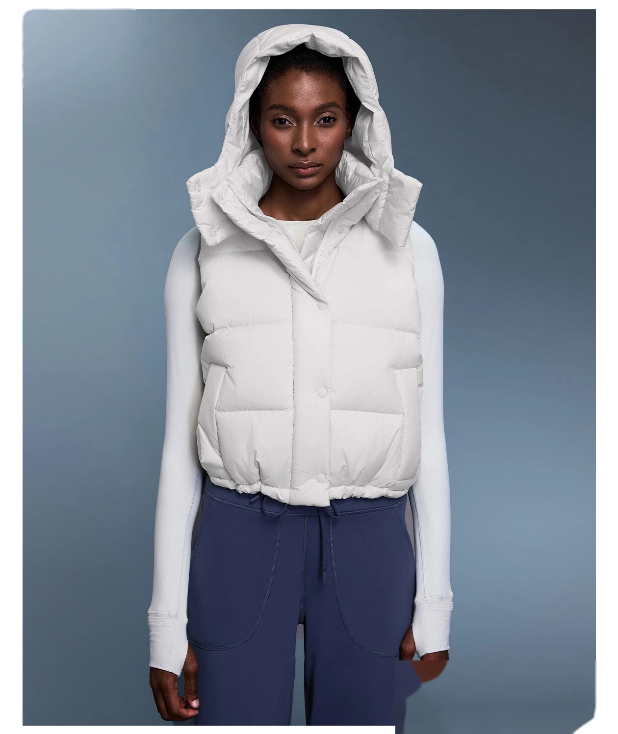 Custom windproof and warm hooded down vest jacket for women in winter. detail